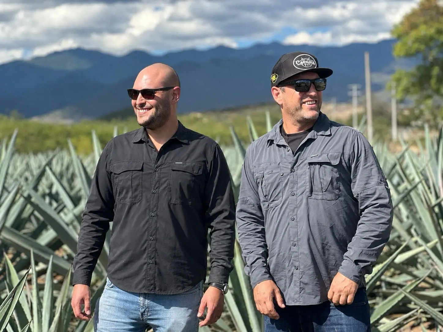 Portrait of the founders in the agave field